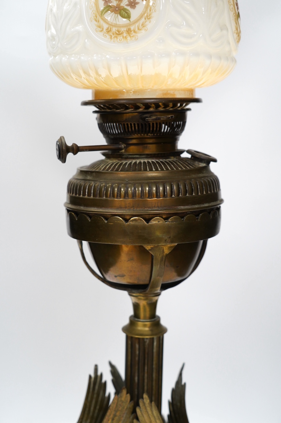 A Victorian brass ‘sphinx’ oil lamp with glass shade. Condition - fair to good